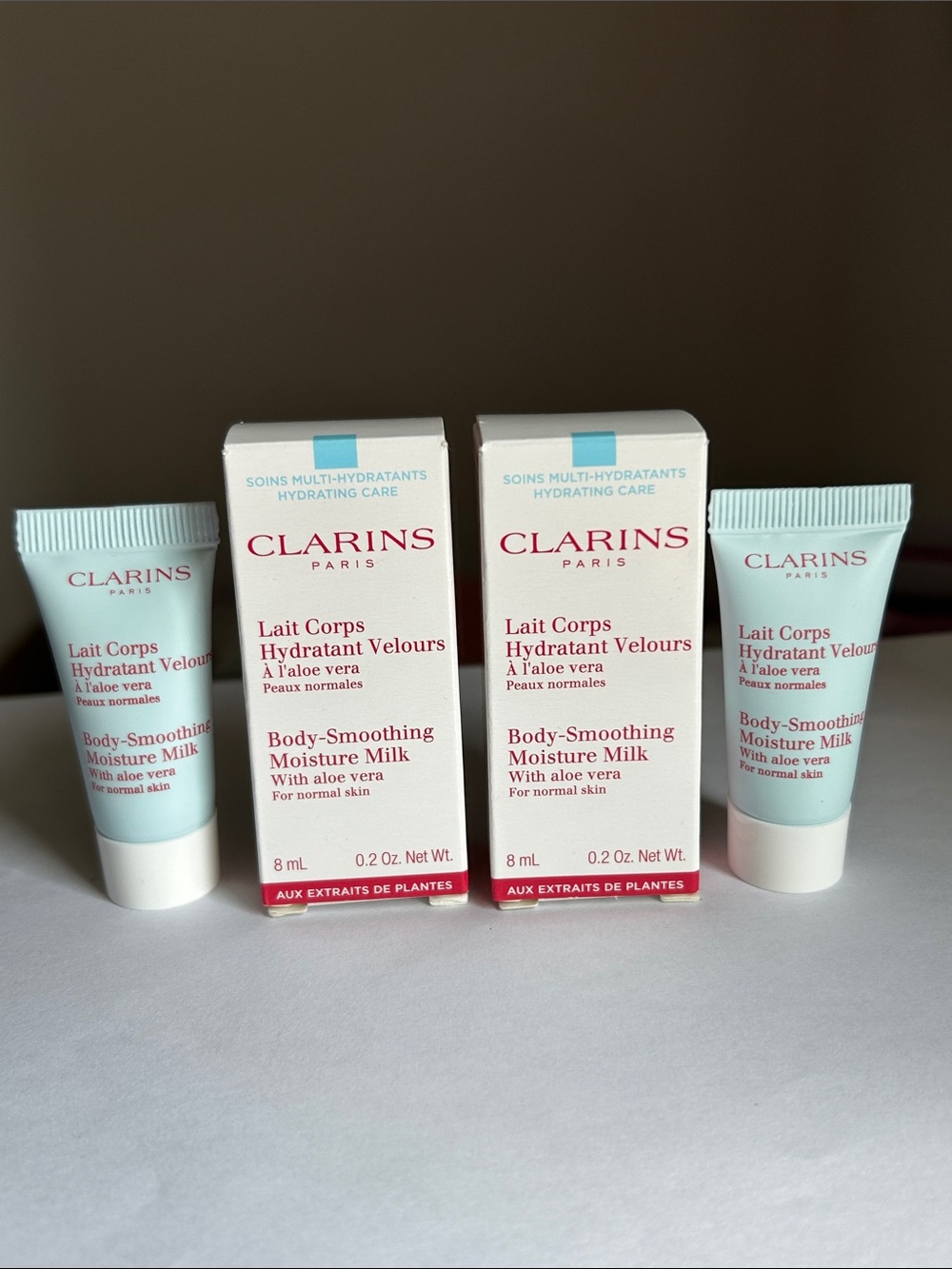 8mlx2 Clarins Body-Smoothing Moisture Milk